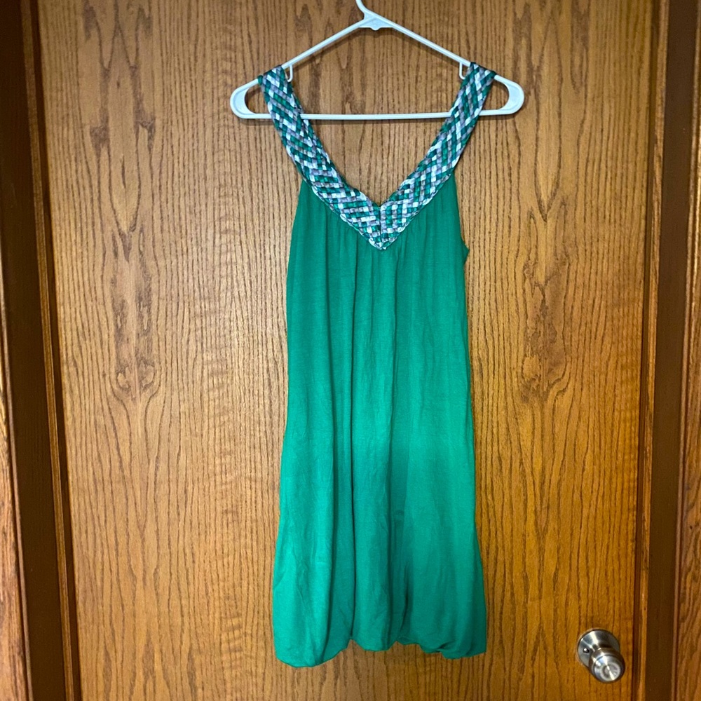 Women’s medium green rayon summer dress. Unique woven straps. Ballooned bottom.
